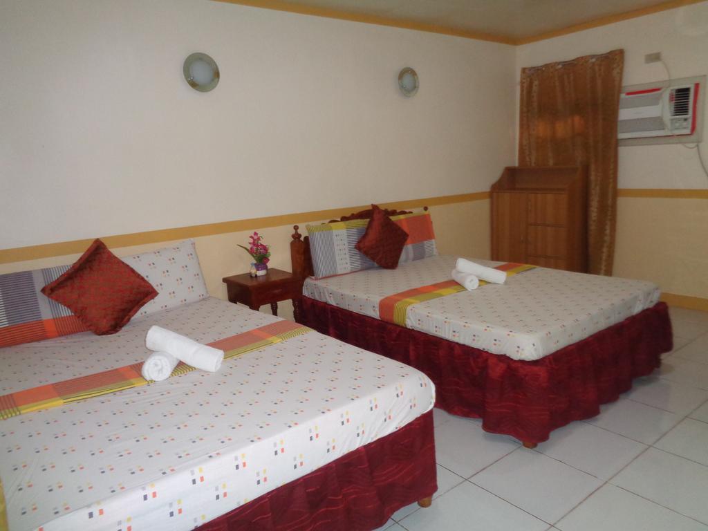 D'Lucky Garden Inn & Suites Tiniguiban Экстерьер фото