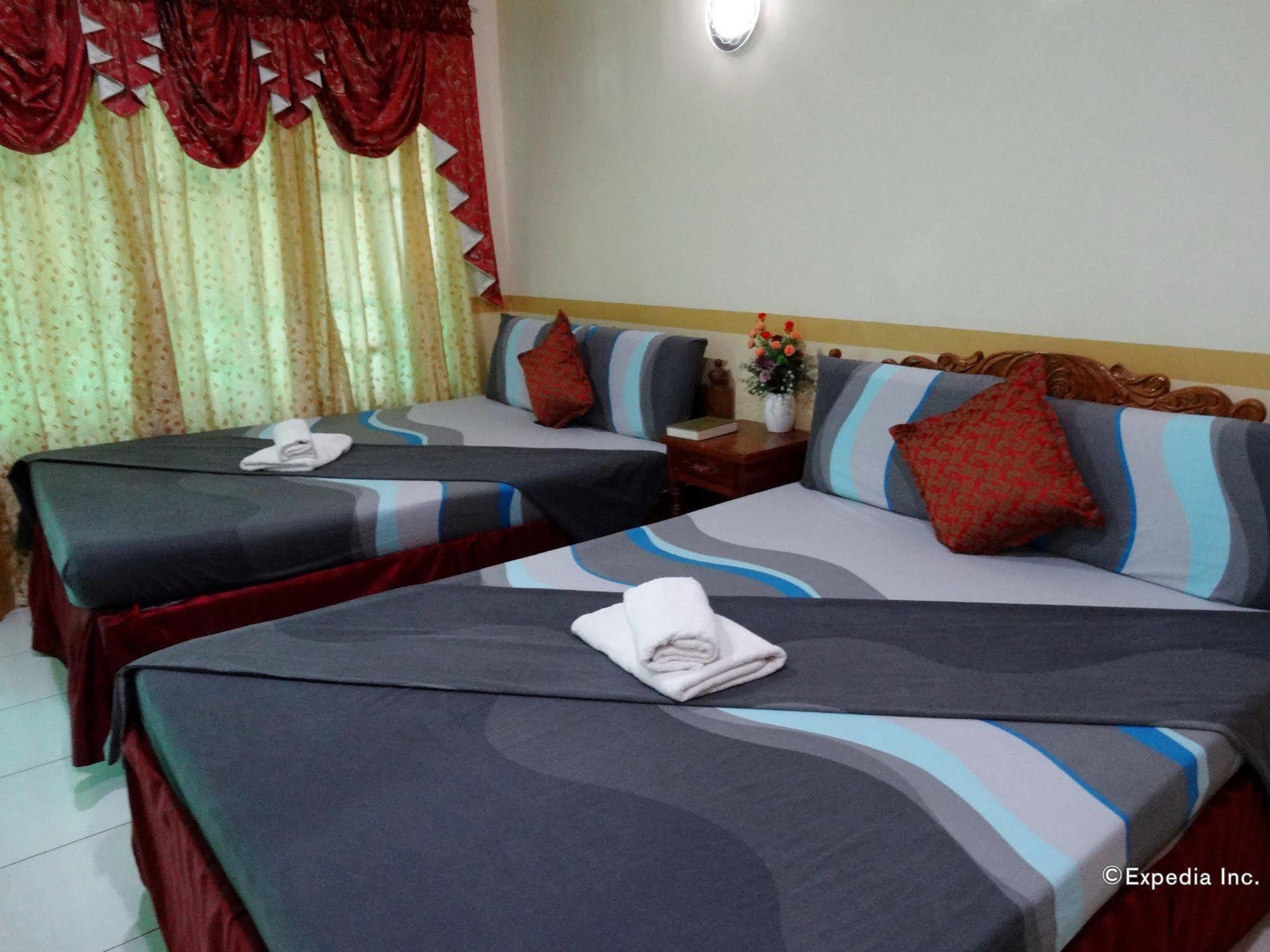 D'Lucky Garden Inn & Suites Tiniguiban Экстерьер фото