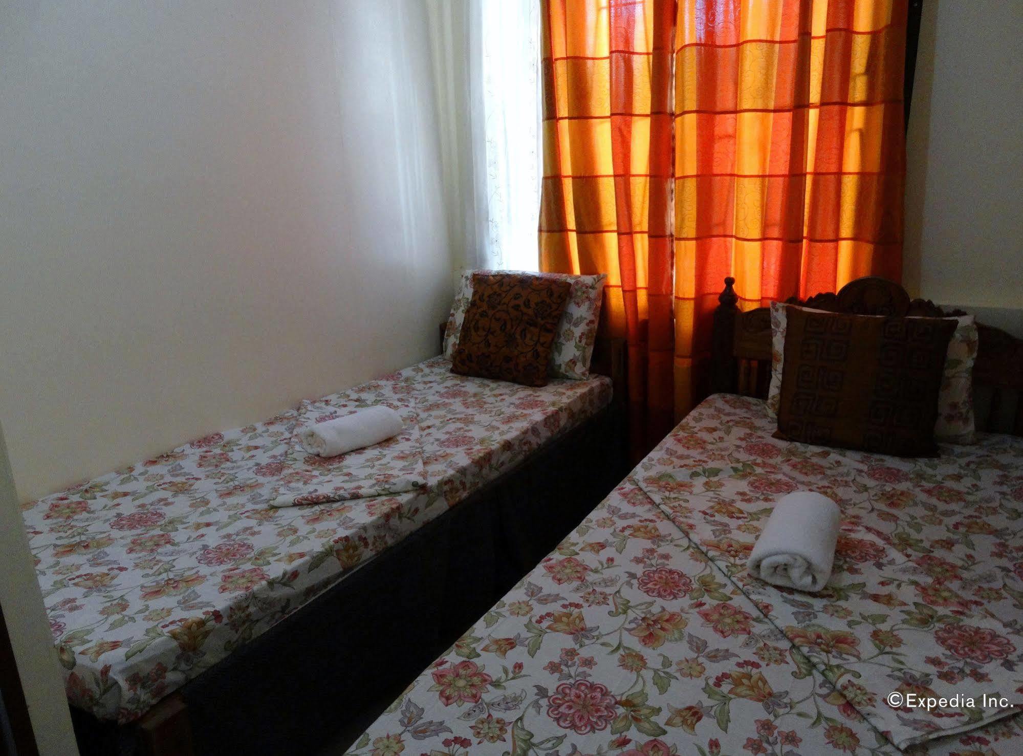 D'Lucky Garden Inn & Suites Tiniguiban Экстерьер фото