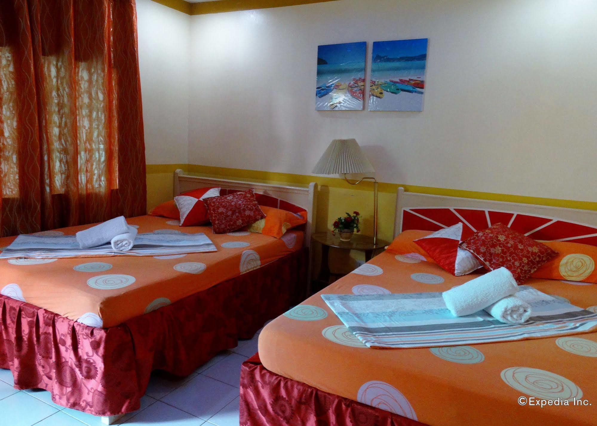 D'Lucky Garden Inn & Suites Tiniguiban Экстерьер фото