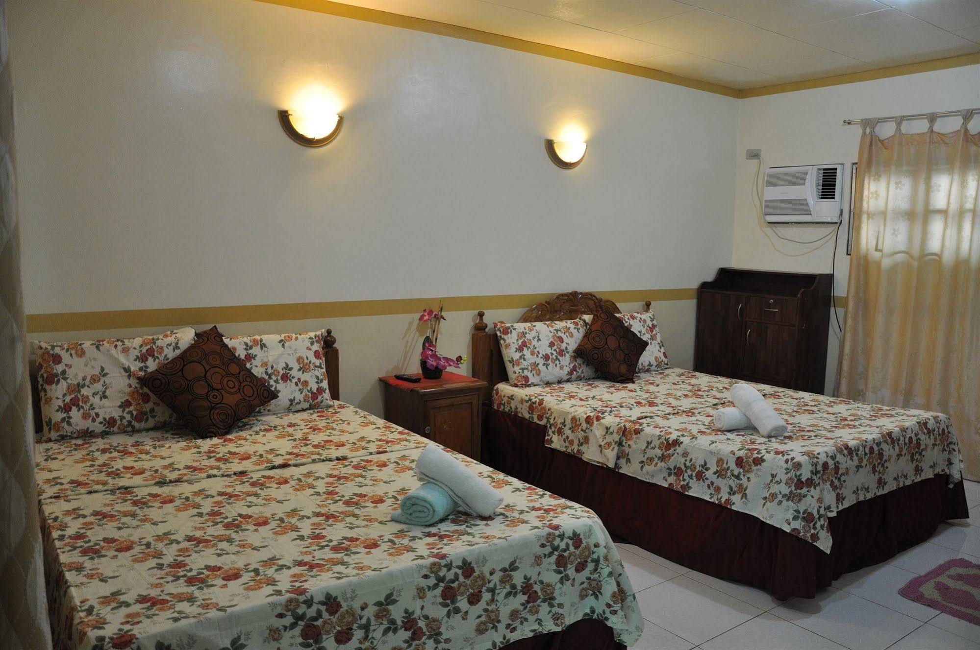 D'Lucky Garden Inn & Suites Tiniguiban Экстерьер фото