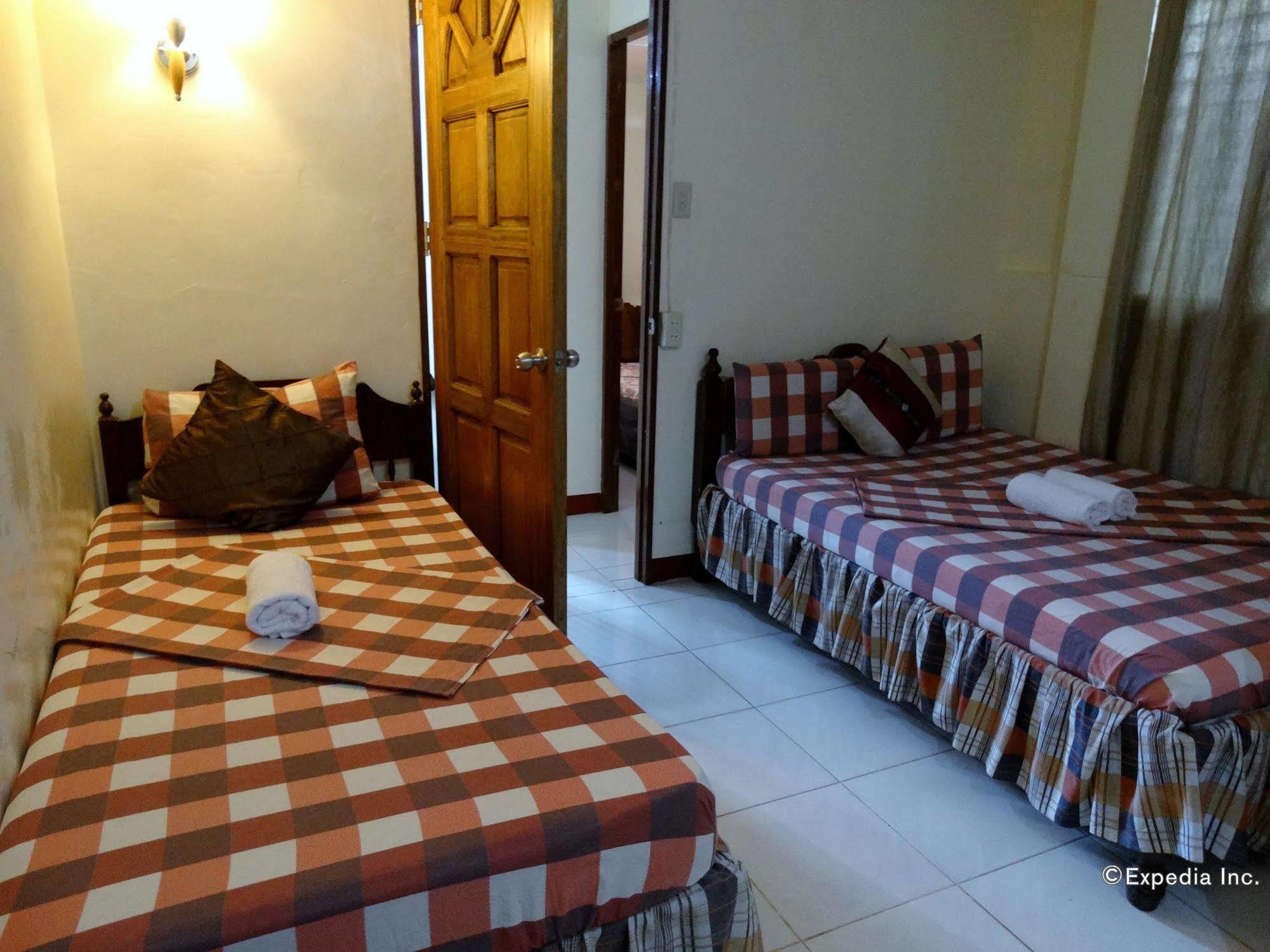 D'Lucky Garden Inn & Suites Tiniguiban Экстерьер фото
